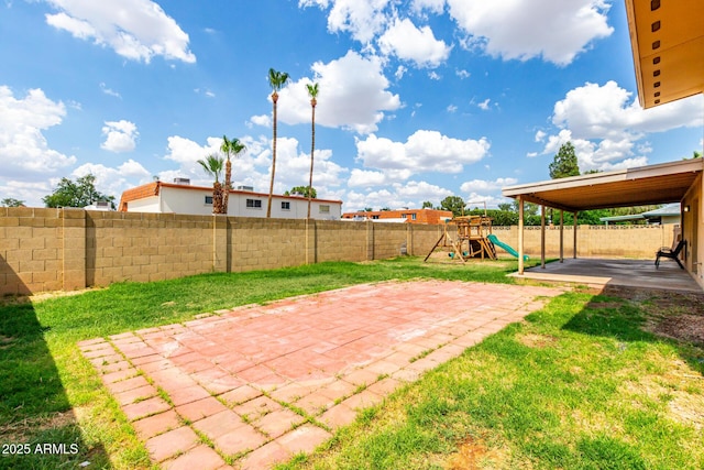 4802 W Hayward Ave, Glendale, AZ 85301 - view of yard featuring a patio and a playground