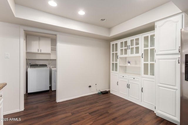 4802 W Hayward Ave, Glendale, AZ 85301 - unfurnished dining area with dark wood finished floors, separate washer and dryer, baseboards, and recessed lighting