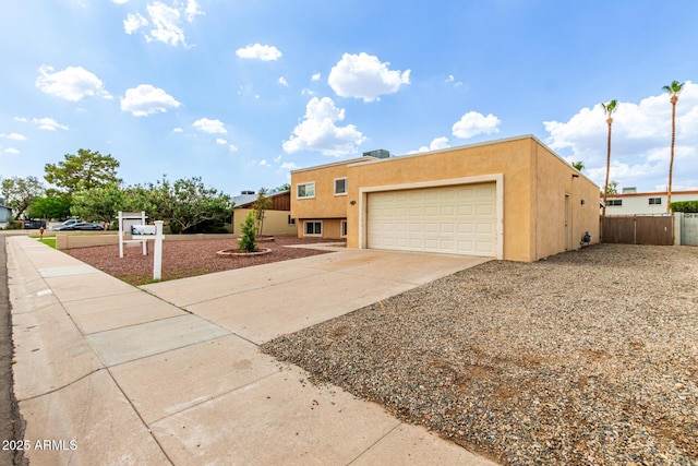 4802 W Hayward Ave, Glendale, AZ 85301 - view of front of property with concrete driveway, a garage, and stucco siding
