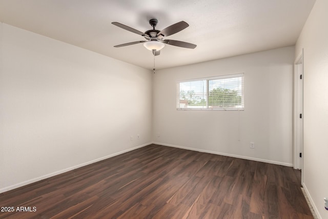 4802 W Hayward Ave, Glendale, AZ 85301 - spare room featuring dark wood-style flooring, baseboards, and ceiling fan