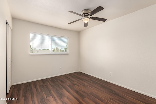 4802 W Hayward Ave, Glendale, AZ 85301 - unfurnished room featuring dark wood-type flooring, ceiling fan, and baseboards