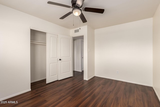 4802 W Hayward Ave, Glendale, AZ 85301 - unfurnished bedroom featuring dark wood-type flooring, baseboards, a closet, and ceiling fan