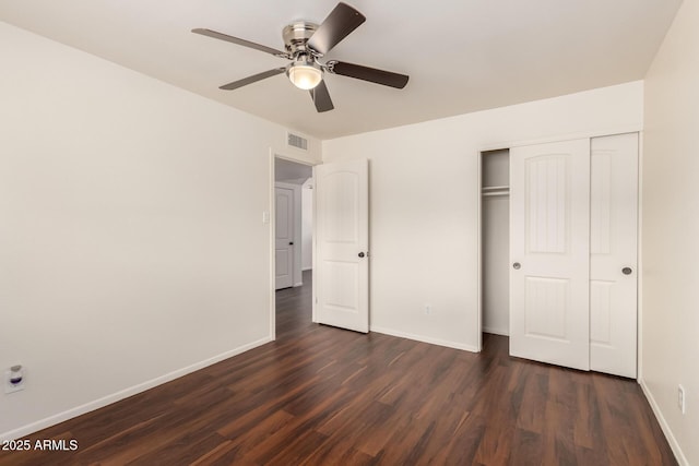 4802 W Hayward Ave, Glendale, AZ 85301 - unfurnished bedroom featuring dark wood-style floors, baseboards, a closet, and ceiling fan