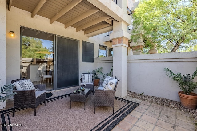 view of patio / terrace with fence