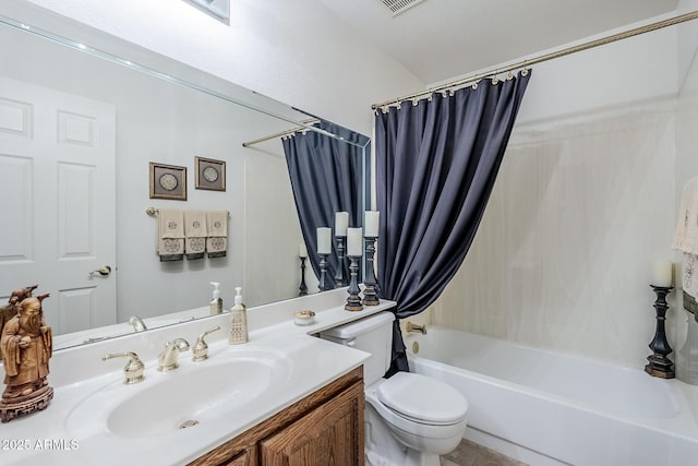 full bathroom featuring vanity, toilet, and shower / tub combo
