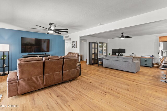 living room with light hardwood / wood-style flooring