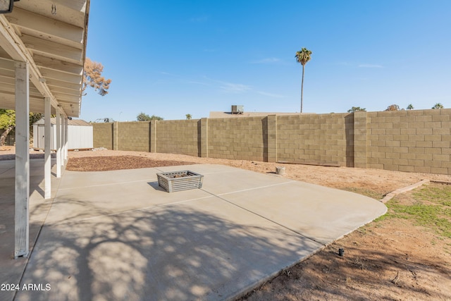 view of patio with a shed