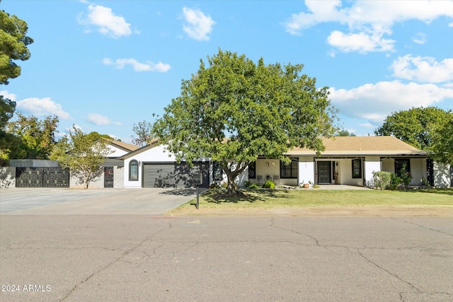 single story home with a garage