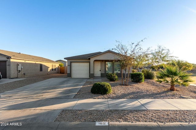 single story home with a garage