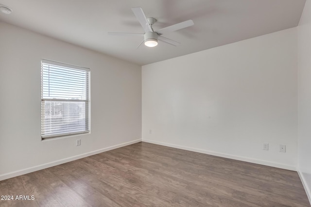 spare room featuring ceiling fan and wood-type flooring