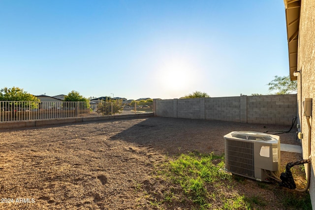 view of yard featuring central AC