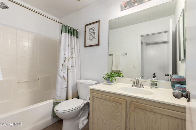 full bath featuring shower / tub combo, vanity, and toilet