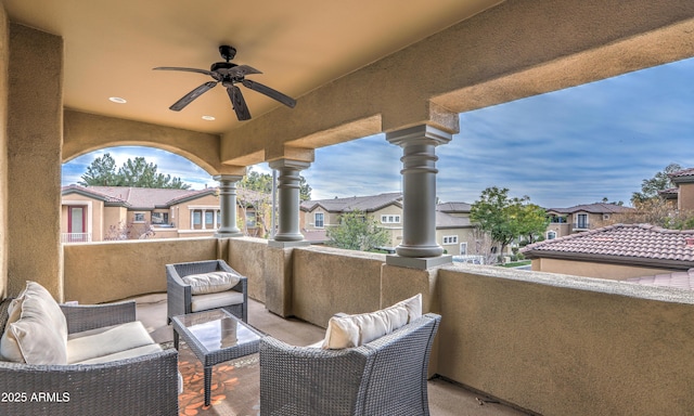 balcony featuring ceiling fan