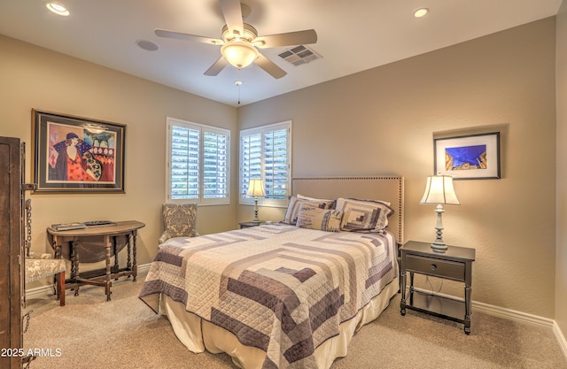 bedroom with light carpet and ceiling fan