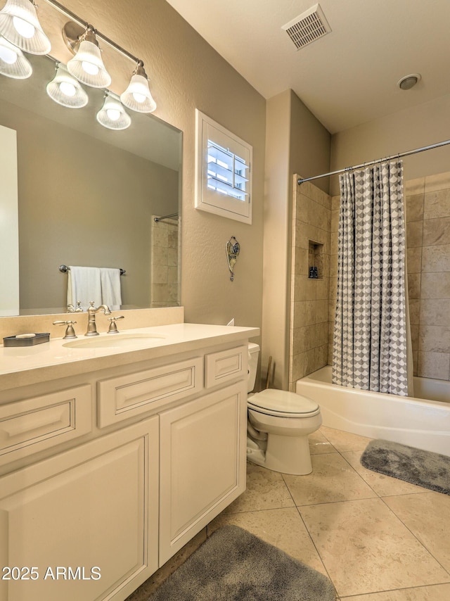 full bathroom with tile patterned flooring, vanity, shower / tub combo with curtain, and toilet