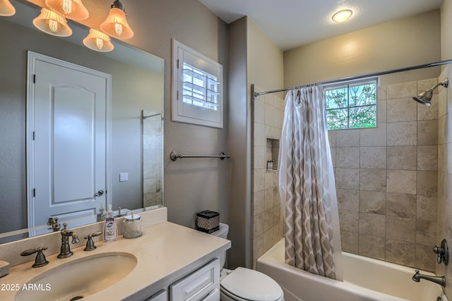 full bathroom featuring vanity, toilet, and shower / tub combo