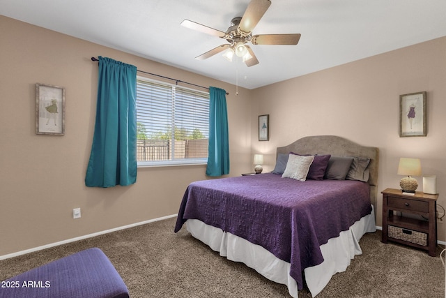 carpeted bedroom with baseboards and ceiling fan