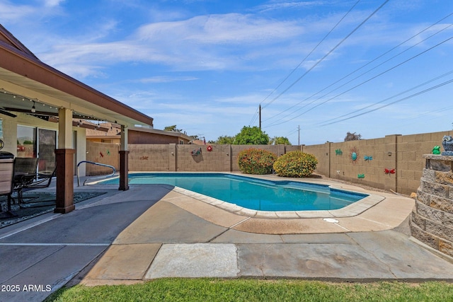 view of swimming pool featuring a patio and a fenced backyard