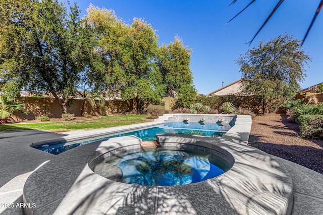 view of pool with an in ground hot tub