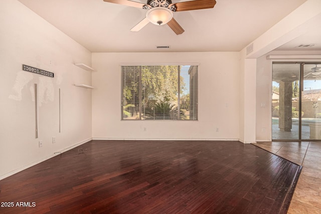 unfurnished room with wood-type flooring and ceiling fan