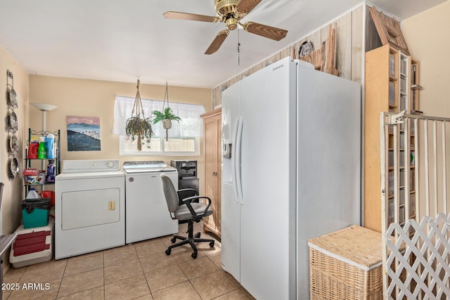 clothes washing area with light tile patterned floors, washing machine and clothes dryer, and ceiling fan