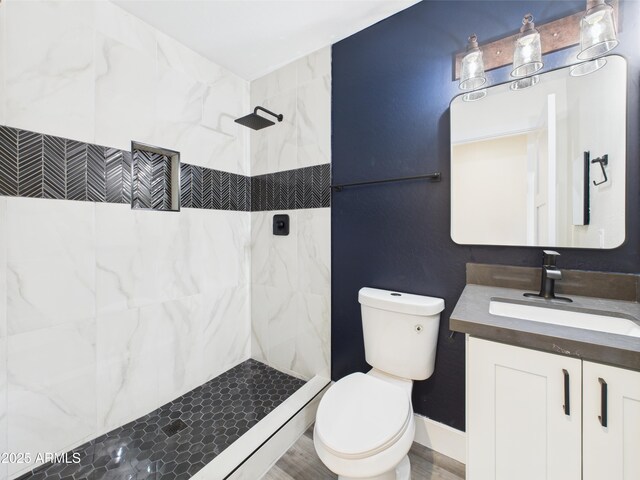1917 E Monroe St, Phoenix, AZ 85034 - full bathroom with toilet, tiled shower, and vanity