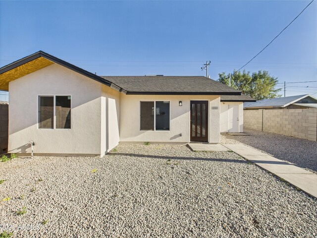 1917 E Monroe St, Phoenix, AZ 85034 - back of house featuring stucco siding and roof with shingles