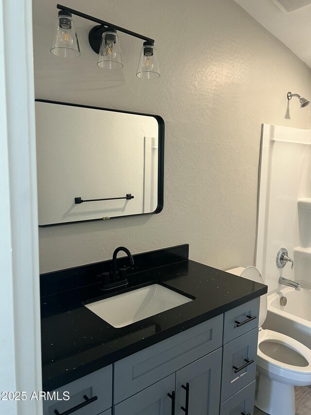 1917 E Monroe St, Phoenix, AZ 85034 - full bathroom featuring vanity, toilet, and shower / bathtub combination