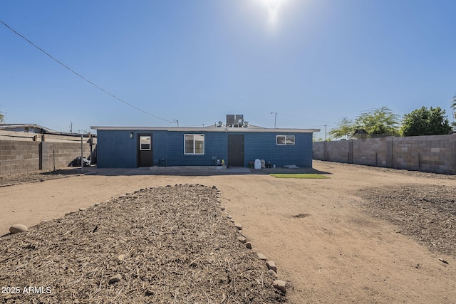 rear view of house with a patio area