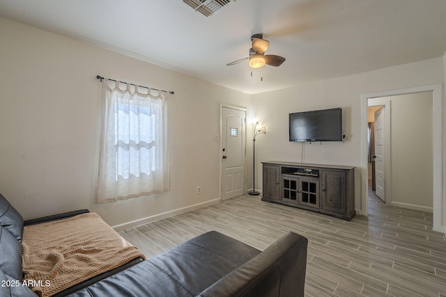 living room with ceiling fan