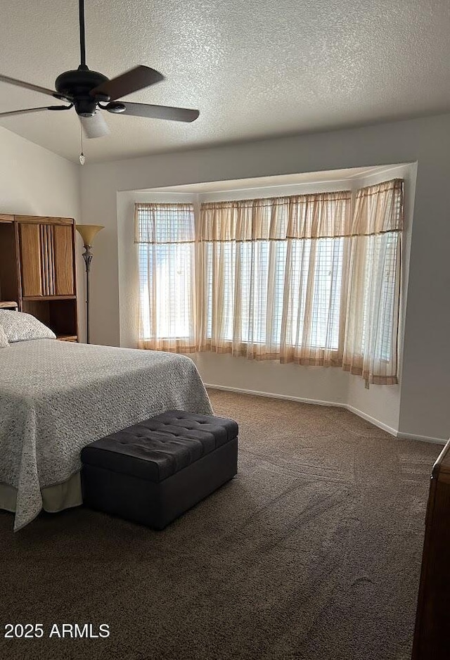 8981 W Tuckey Ln, Glendale, AZ 85305 - bedroom featuring a ceiling fan, carpet flooring, and a textured ceiling