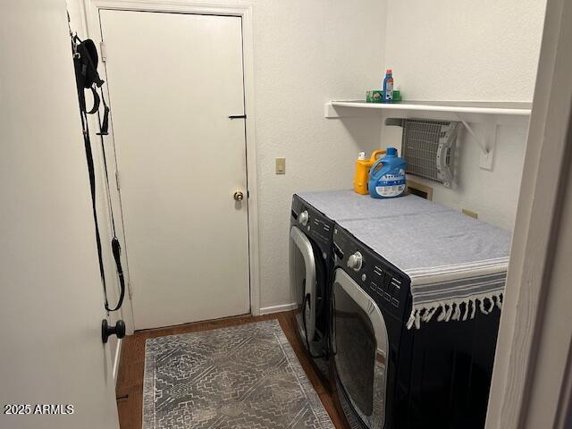 8981 W Tuckey Ln, Glendale, AZ 85305 - washroom with washing machine and dryer and dark wood finished floors