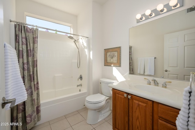 bathroom featuring visible vents, toilet, shower / bath combo with shower curtain, vanity, and tile patterned floors