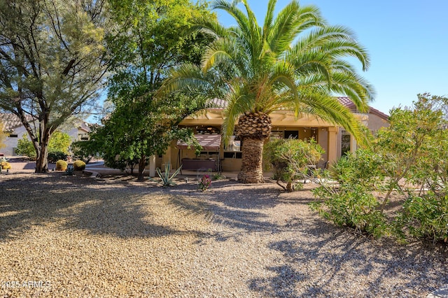 exterior space featuring stucco siding