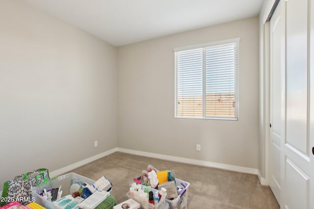 interior space featuring light colored carpet