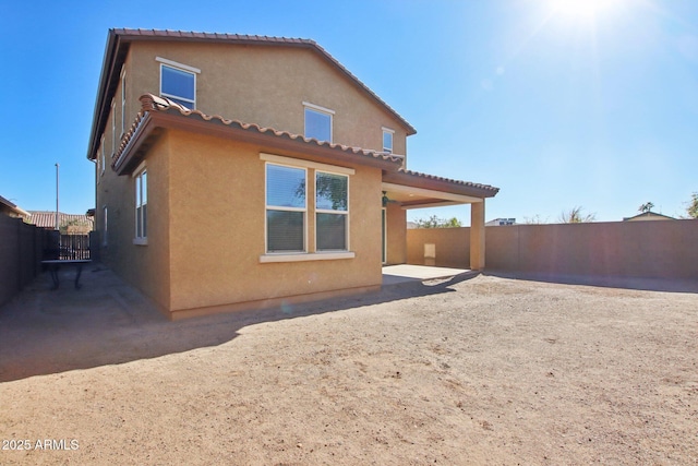 rear view of property with a patio