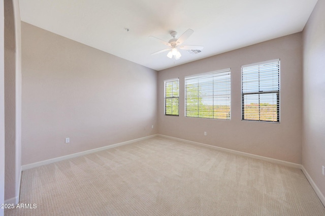 20750 N 87th St Unit 2062, Scottsdale, AZ 85255 - unfurnished room with ceiling fan, light colored carpet, and baseboards