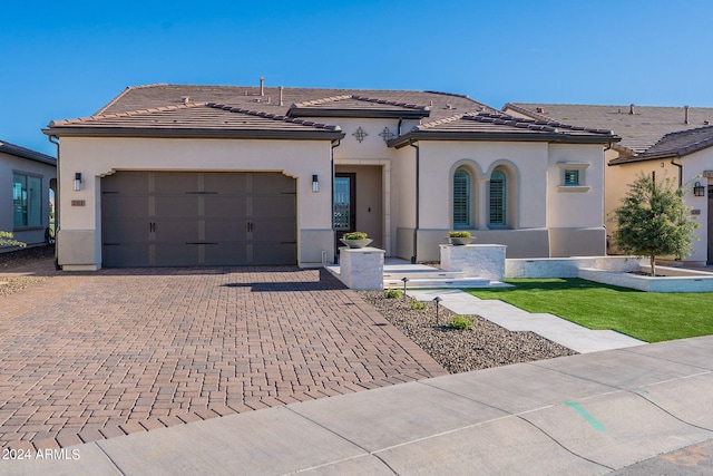 view of front of property featuring a garage