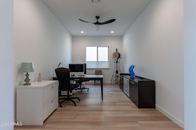 office area featuring light hardwood / wood-style flooring and ceiling fan