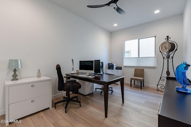 home office with ceiling fan and light wood-type flooring