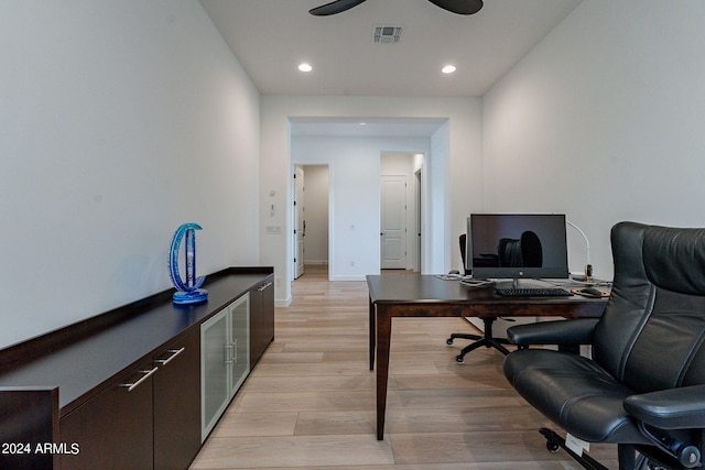 office featuring ceiling fan and light wood-type flooring