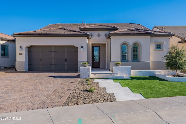 view of front of home featuring a garage