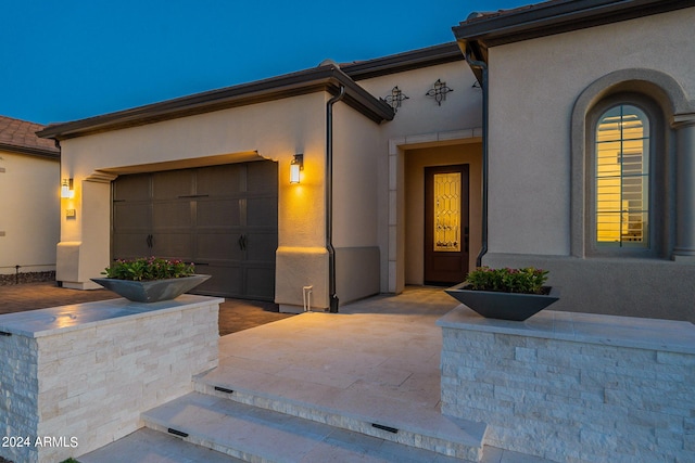 view of front of home with a garage