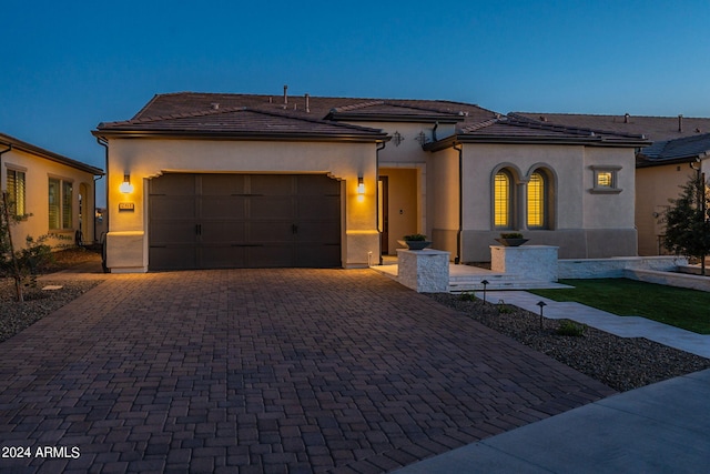 view of front of home featuring a garage