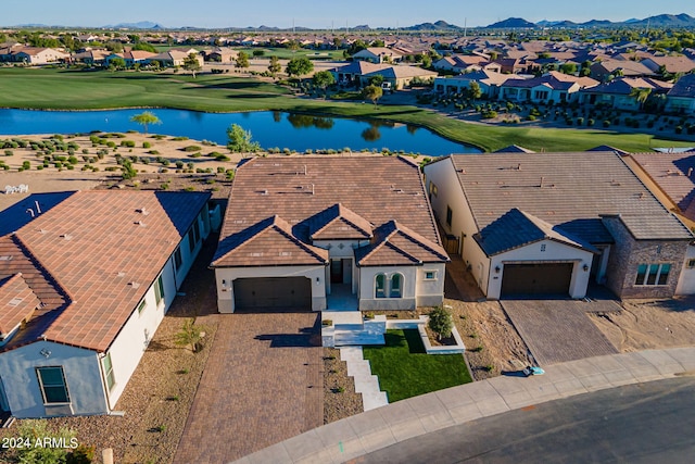 bird's eye view featuring a water and mountain view