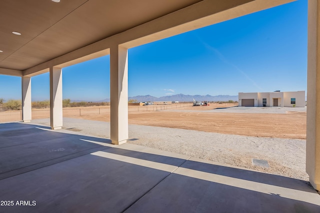 view of patio with a mountain view