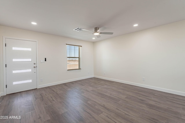 entrance foyer featuring ceiling fan and dark wood-type flooring