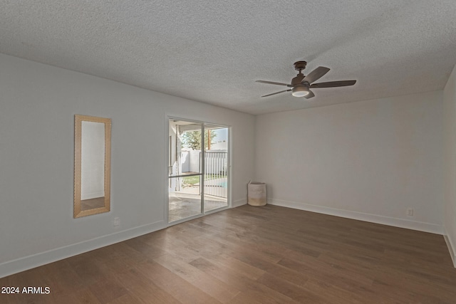 spare room with ceiling fan, hardwood / wood-style flooring, and a textured ceiling