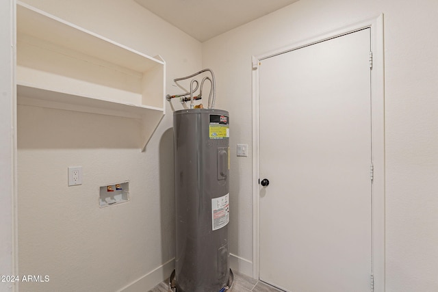 utility room with electric water heater