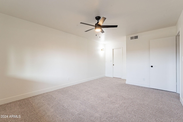 unfurnished bedroom with carpet flooring and ceiling fan